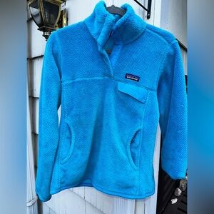 Patagonia women’s Small re-tool fleece jacket turquoise blue. Perfect condition